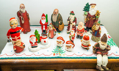 Display of a collection of Santa Clause figurines