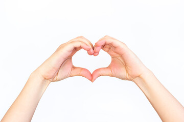 Hands showing a heart shape isolated on a white background. Love and harmony