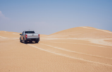 Car driving in desert during trip