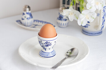 Boiled egg on white and blue Delft porcelain 