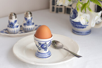 Boiled egg on white and blue Delft porcelain 
