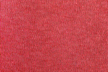 Knitted red texture background. Knitwear