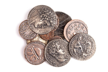 Pile of Ancient Roman Coin Replicas  Isolated on a White Background