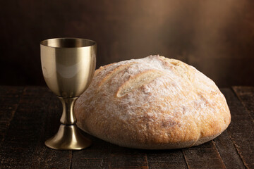Sacrament of Holy Communion  on a Dark Wooden Table