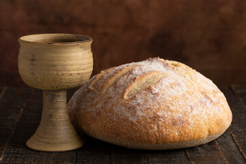 Sacrament of Holy Communion  on a Dark Wooden Table