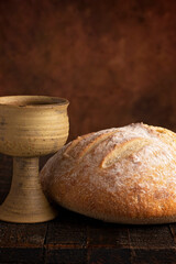 Sacrament of Holy Communion  on a Dark Wooden Table