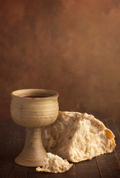 Sacrament of Holy Communion  on a Dark Wooden Table