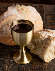 Sacrament of Holy Communion  on a Dark Wooden Table