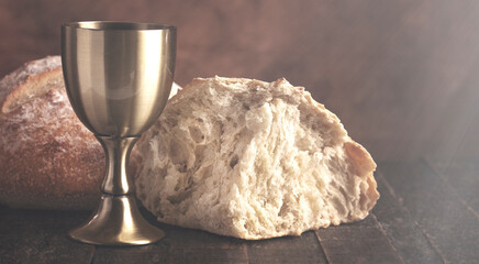 Sacrament of Holy Communion  on a Dark Wooden Table