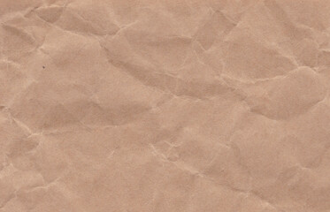 Naklejka premium Crumpled cream paper background texture. Paper craft