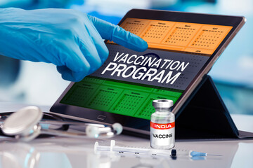Working with tablet in the program of the vaccination schedule for India. Photomontage with 3d...