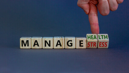 Manage stress and be health symbol. Doctor turns cubes and changes words 'manage stress' to 'manage health'. Beautiful grey background. Psychological, business and manage stress concept. Copy space.