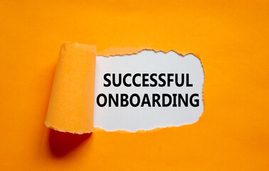 Successful onboarding symbol. Words 'Successful onboarding' appearing behind torn orange paper....