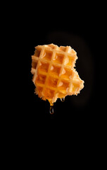 Waffle with honey isolated