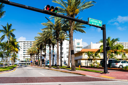 Art Deco Historic District In South Beach, Florida With Collins Avenue, Ocean Drive Street Signs And Stoplight Traffic Light In In Summer