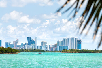 Bal Harbour, Miami Florida with turquoise Biscayne Bay Intracoastal water by cityscape skyline of...