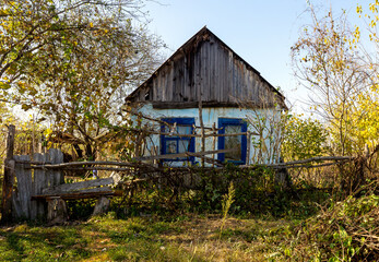 Old houses on a ranch on a sunny autumn day.