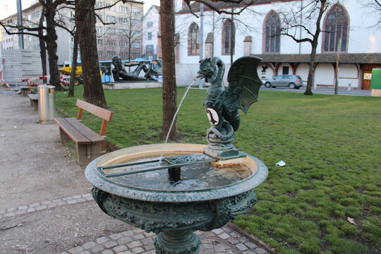 Iconic fountains of Basilisk in the city of Basel in schiffl&auml;nde universit&auml;tsspital tram stop.