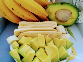 Slices fruits on the plate