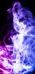 Colored smoke on black background