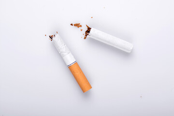 Broken cigarette on white background , World No Tobacco Day Tobacco and lung health concept .