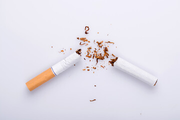 Broken cigarette on white background , World No Tobacco Day Tobacco and lung health concept .