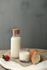 Milk with fresh white baguette
