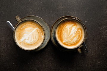 two cups of cappuccino, top view