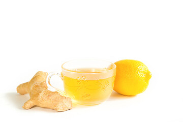 Medicinal tea in a cup, ginger, lemon-strengthen the immune system in the cold season. Vitamin drink for health and ingredients on a white background.