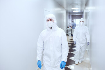 Fototapeta premium Doctors in protective uniforms working at hospital during coronavirus pandemic