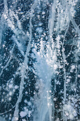 Blue background of Ice texture. Lake Baikal in Winter