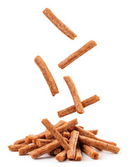 Rye croutons fall on heap on a white background. Isolated