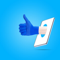 handyman online service concept. worker showing thumbs up out from phone screen. isolated on blue...
