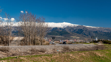 Rural landscape with Sierra Nevada in the background. Landscape with snowy mountain in the background