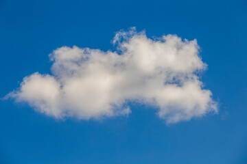 White clouds on a blue sky background