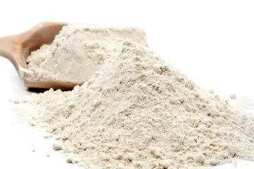 Fototapeta na wymiar Wheat flour. Flour close-up. An ingredient for baking bread and rolls. Scoop with flour