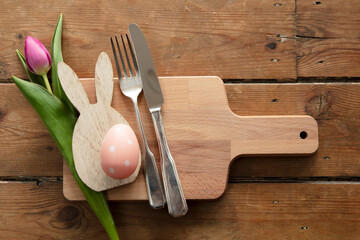 Easter holiday meal background, easter bunny with eggs and spring flowers