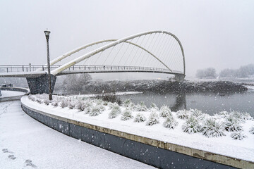 During a snowstrom, the Peter Courtney Minto Island Bridge, it connects Salem's Riverfront park to...