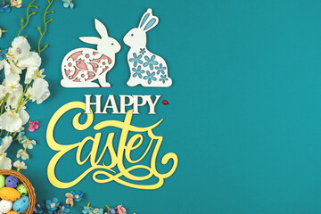 Happy Easter concept with easter eggs and beautiful happy easter wooden text, easter background with copy space