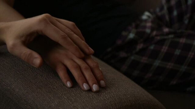 close up of a hands. Sofa. Help. Helping. Family problem. 
