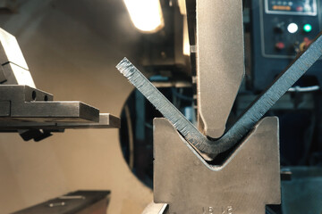 The process of metal bending on a CNC bending machine. Bending of metal using a v-shaped matrix and...