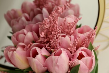 Bouquet of beautiful pink tulips in early spring as a postcard or picture with nice flowers