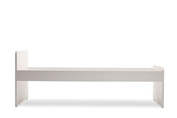 Studio shot of a white single empty bed without mattress