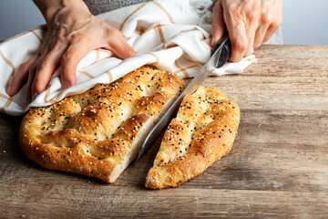 Ramazan pidesi, Turkish flatbread baked during the month of ramadan is a round bread with fennel...