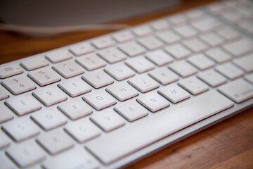 Clean and ready to use home office computer keyboard. Working at home in the quarantine with clean and sanitized accessories. Home office concept. Technology concept.