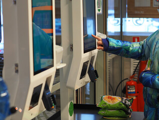 Shopping in the store. Pay with a bank card at