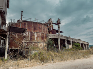 Fototapeta premium Abandoned factory. Industrial interior, abandoned factory building