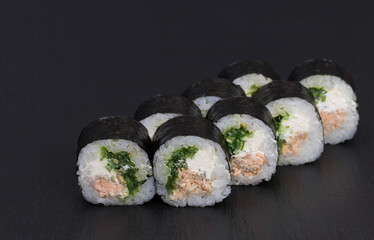Sushi Rolls Sake Chukka with RICE, FRIED SALMON, CREAM CHEESE, WAKAME and SEZAM