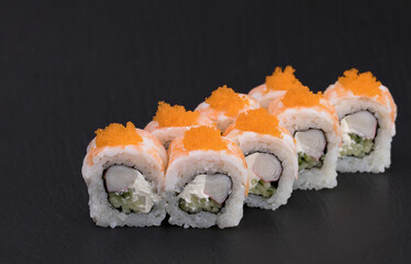Sushi Rolls Suri Ebi Maki with RICE, TIGER SHRIMPS, CRAB STICKS, CREAM CHEESE, CUCUMBERS and MASAGO