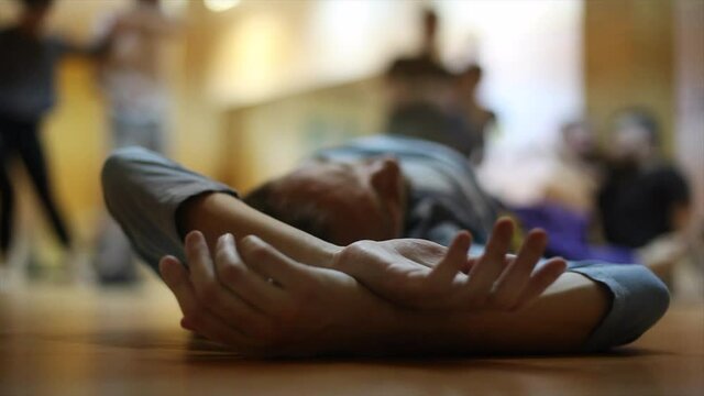 dancer somatic hands low view